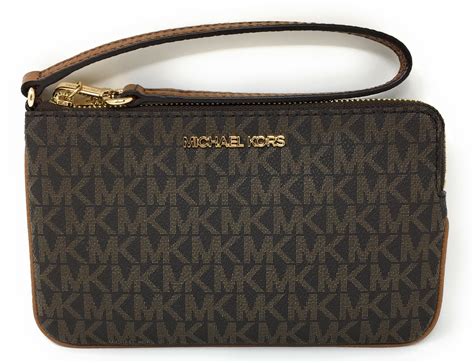 brown and white michael kors wallet clutch|Michael Kors clutch sale.